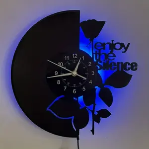 Retro vinyl record wall clock with LED backlight, featuring a rose-shaped design. Suitable for home decoration, hotel decoration, office decoration, as a holiday gift, birthday gift, tabletop decoration, bedroom night light, or as an artistic decoration.