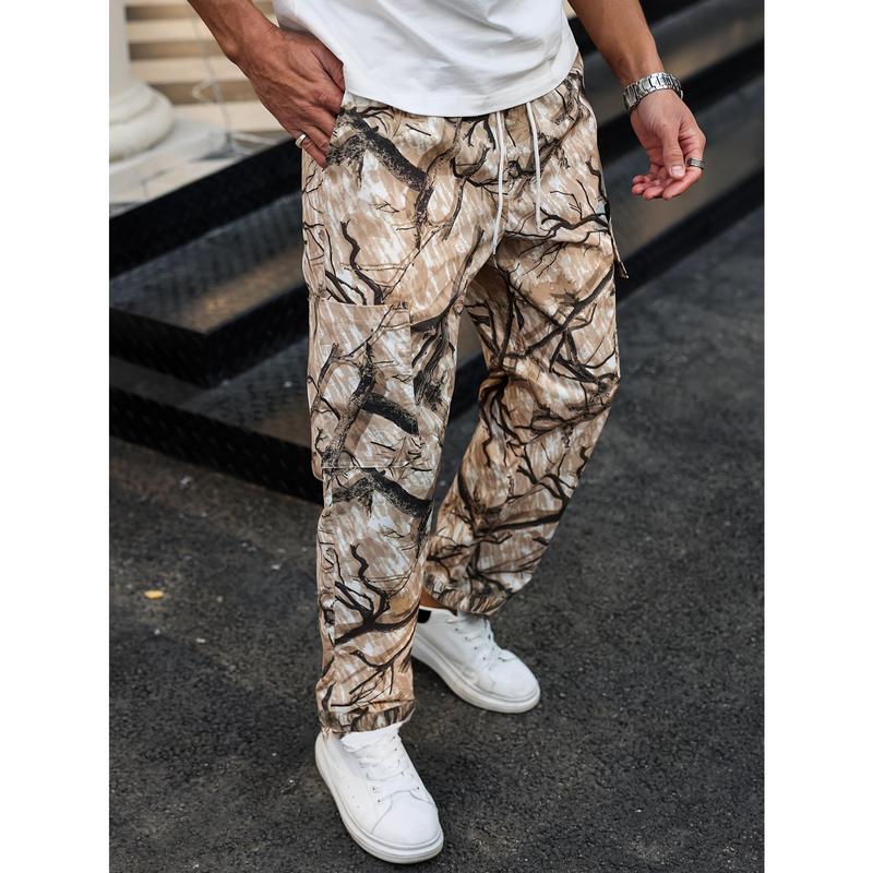 Men's camouflage print zippered pocket trousers, slim-fit athletic pants, durable trousers for autumn, men's wear-resistant outdoor training pants, streetwear fashion, vacation wear, men's clothing