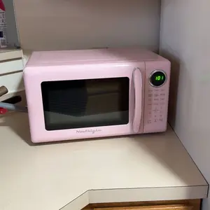 Nostalgia Retro 700W Microwave Oven – 0.7 Cu Ft Capacity