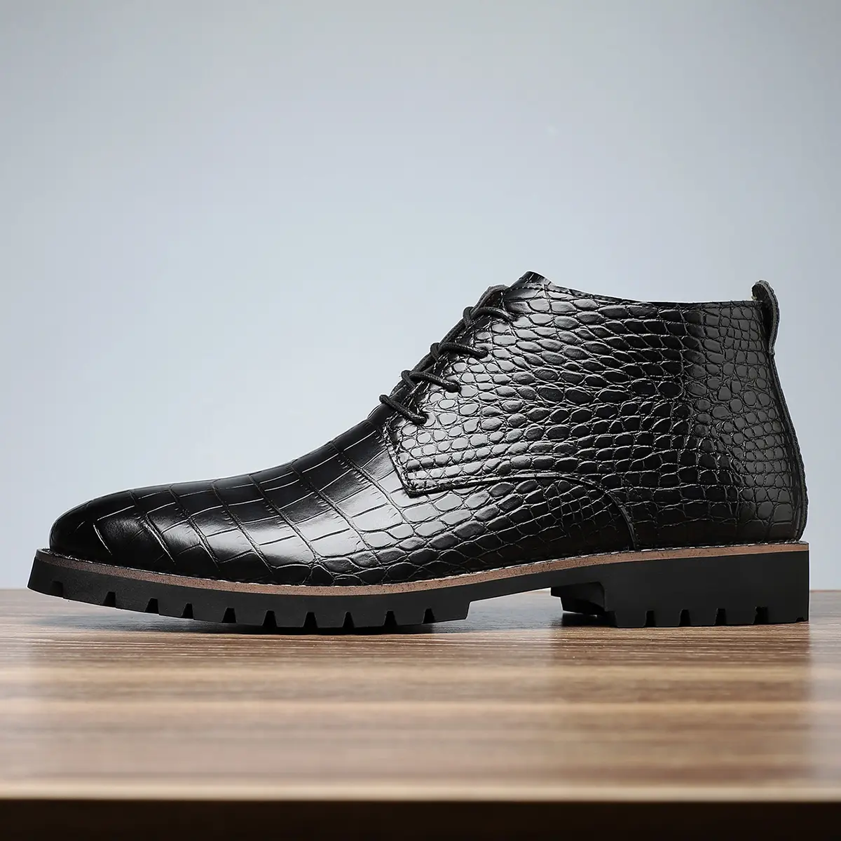 A pair of men's casual boots - solid color stirrup design, faux leather upper, rubber sole, faux lining and insole, versatile everyday shoe for all seasons
