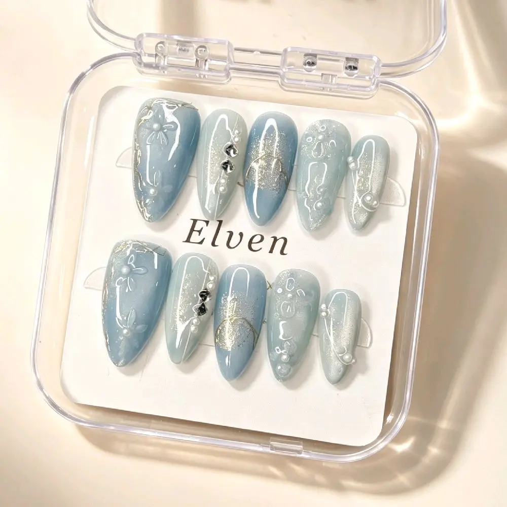 Handmade Light Blue Ombre Cat Eye Press On Nails With 3D Flowers, Gold Foil, Pearls & Black Crystal Accents, Medium Almond Reusable Fake Nails For Dreamy Elegant Wear