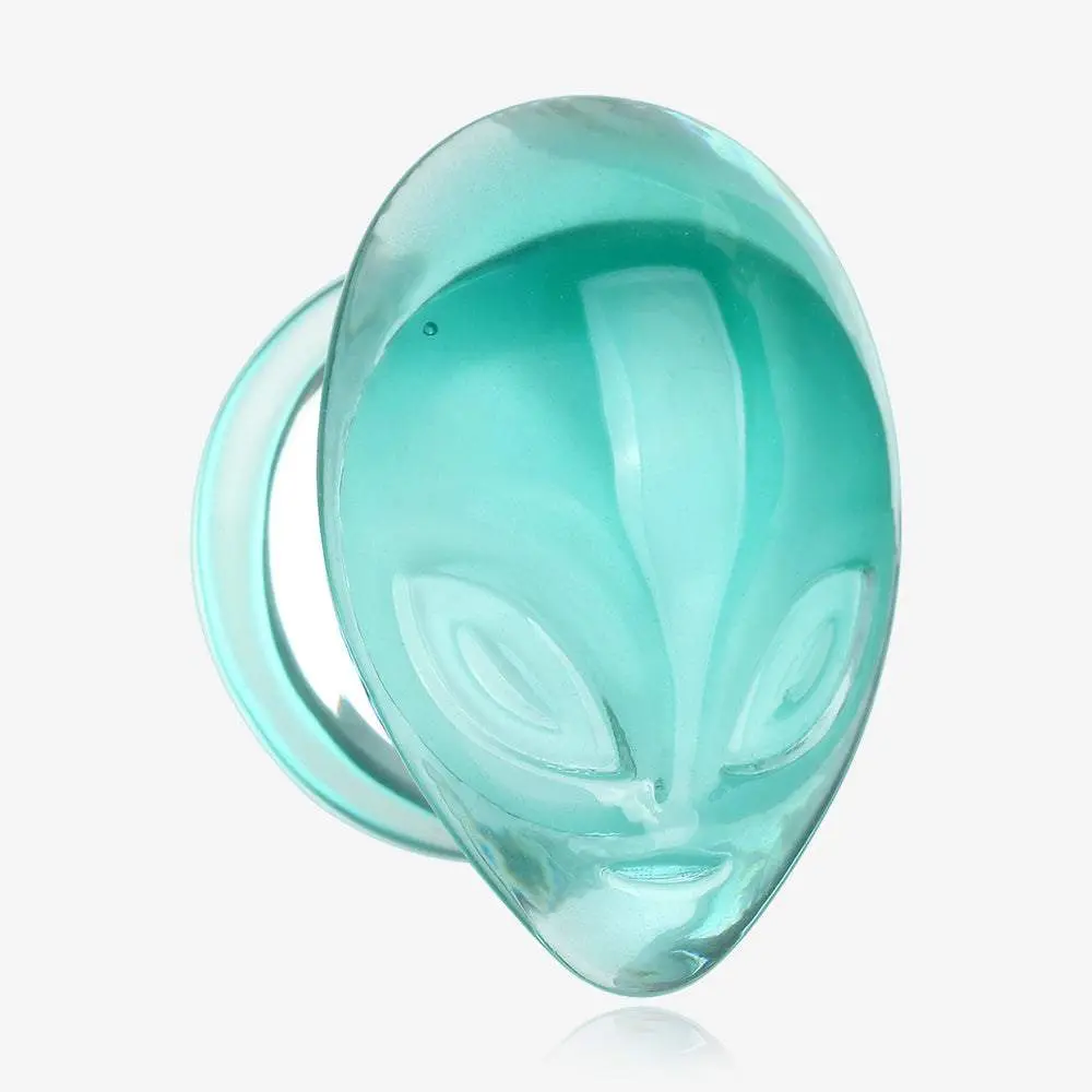 A Pair of Green Alien Head Glass Double Flare Plugs