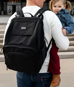 THE OG DAG: Diaper bag backpack designed by dads, for dads. Patent-pending design for one-handed access.