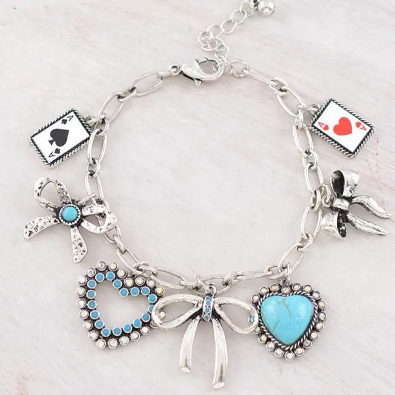 Western Bow Charm Bracelet Approx 7.5L Lobster Claw Closure with Extending Hooks Featuring Heart & Bow Charms