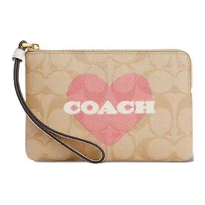 COACH Corner Zip 16 Classic Monogram Heart Zip Top Clutch Bag for Women, Faux Leather, Light Khaki and Chalk White