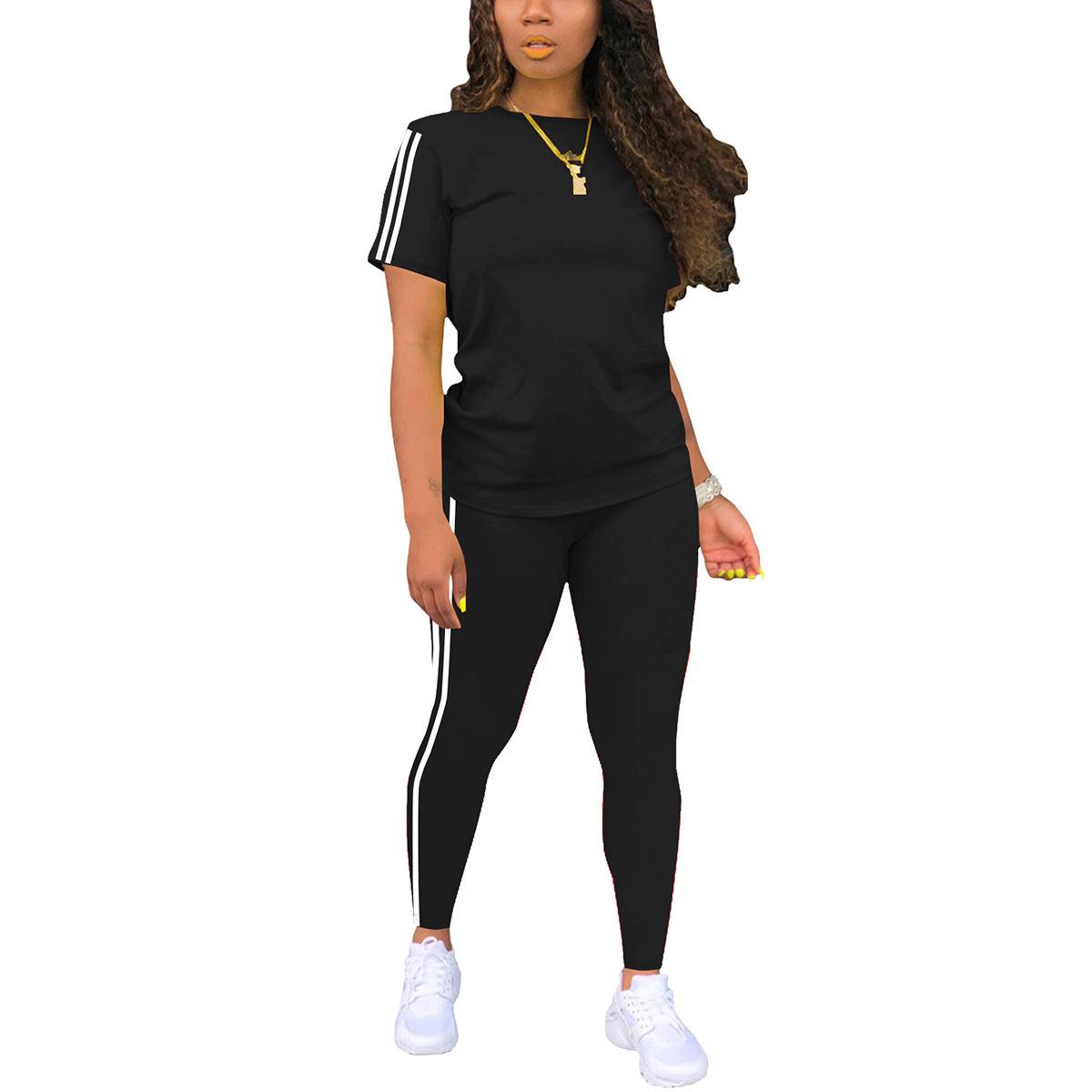 Women’s athletic fitness striped set: short-sleeve top with white side stripes + high-waisted leggings, slim fit that flatters the figure, two-piece set