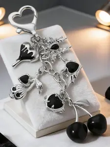 Exquisite and cool cherry bag decoration with niche design, cherry and heart-shaped wings decoration, detail embellishment design, chain decoration, heart-shaped buckle, bag accessories, Fashion Bag Charms, can be given to friends