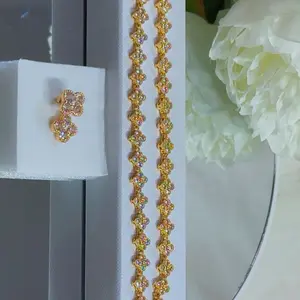 Luxury gold clover bracelet and earring set