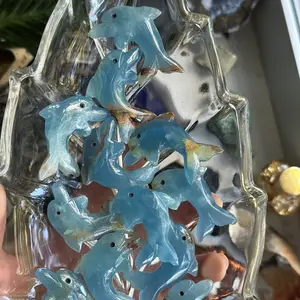 Natural lemurian aquatine calcite crystal dolphin carving