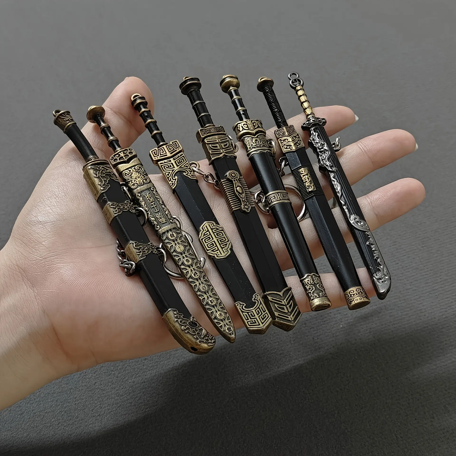 Miniature Swords Set, 7-Piece Ancient-Inspired Metal Pendant Collection with Sheath, Toy Gift for Game & Anime Enthusiasts, 7Pcs, Durable, Ideal Gift For Game & Anime Enthusiasts