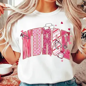 Valentine Nurse Varsity Coquette T-Shirt, Pink Nursing Graphic Tee for RN CNA NICU, Cute Medical Bow Stethoscope Shirt, Unisex Soft Cotton Nurse Gift Tee, Valentine’s Day Gift for Nurses