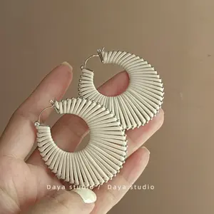 Minimalist high-end earrings, niche French vintage leather woven hollow circle stud earrings