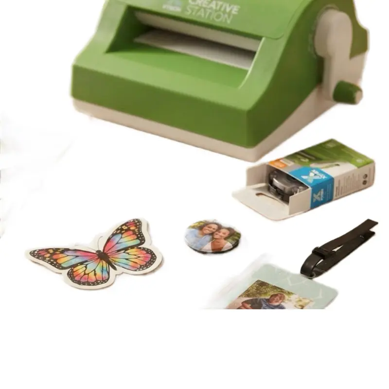 máquina de adhesivos, laminadora e imán manual de Xyron).