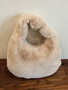 Niche design plush shoulder bag, knotted handle  shoulder bag, simple casual   versatile shoulder bag, the first choice for Christmas gifts, personalized bags suitable for daily commuting, shopping and dating.