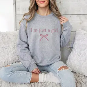 I'm Just A Girl Pink Bow Graphic Sweatshirt for Women Cute Coquette Aesthetic Crewneck Pullover Y2K Soft Girlhood Trendy Slogan Long Sleeve Fleece Streetwear Top Gift for Her
