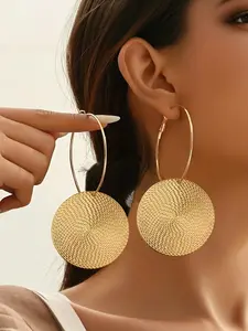 Large, exaggerated round earrings with a retro style Jewelry