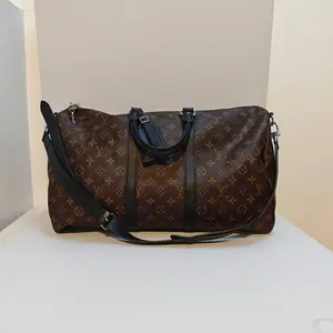 Pre-owned Louis Vuitton leatear Luggage Keepall Bandoulière 45 bag in Monogram Macassar canvas
