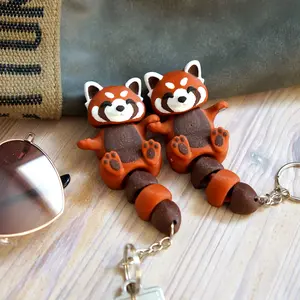 Pair of Flexible Magnetic Red Panda Keychains