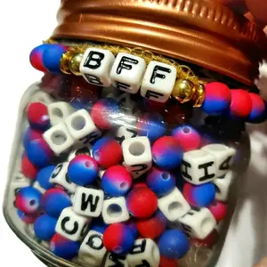Purple and Pink Bracelet Jar with BFF Beads and Assorted Colors for Stylish Accessories