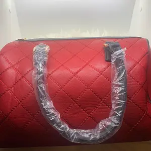 Large Red handbag with long strap. Square line designs PU Leather