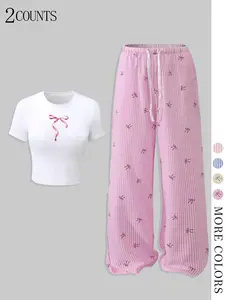 Cute Bow Print 2-Piece Loungewear Set | Soft Pink Striped Pajamas + White Crop TopCozy, chic & perfect for lazy days! Flowy wide-leg pants with playful bow details + fitted cropped tee—mix of comfort & Y2K vibe. Multiple colors available!#TikTokShop #Loun