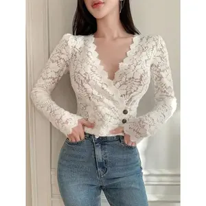Elegant white lace V-neck blouse for women — long sleeves, semi-sheer fabric, button details; perfect for spring/fall fashion; autumn-style blouse | buttoned long sleeves | stylish stitching details
