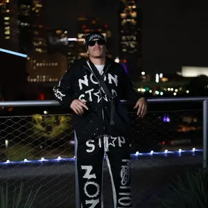 Non Stop Motion Jacket - Black Coat with White Lettering, Stylish Design for Men - Coats, Menswear
