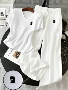 Fashionable Two-Piece V-Neck Set: Soft stretch T-shirt paired with high-waisted wide-leg pants. Comfortable and breathable, perfect for casual days, loungewear, or street style outfits. A must-have TikTok trending style!