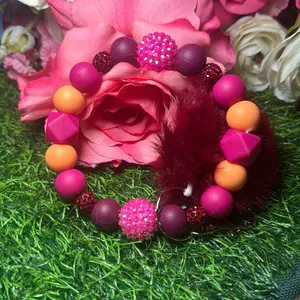 Red sunset wristlet keychain color scheme burgundy, magenta, sherbet orange and bling made with wire