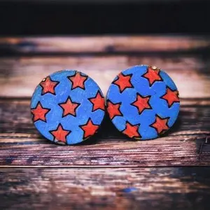 round wood earring studs. red and blue stars