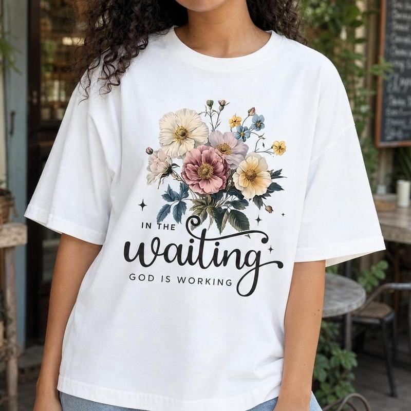 Women's Loose-Fit Baggy Drop Shoulder Cotton Crew Neck Short Sleeve Tee - Casual Breathable Christian Inspirational Top with Floral Graphic, "In the Waiting God Is Working" Faith Message