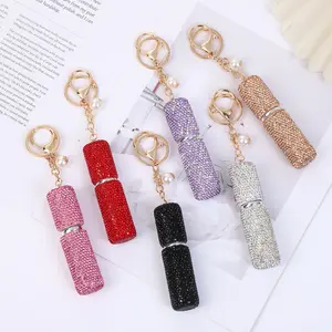 Diamond-studded perfume bottle keychain, creative mini spray bottle keyring, bag decoration pendant
