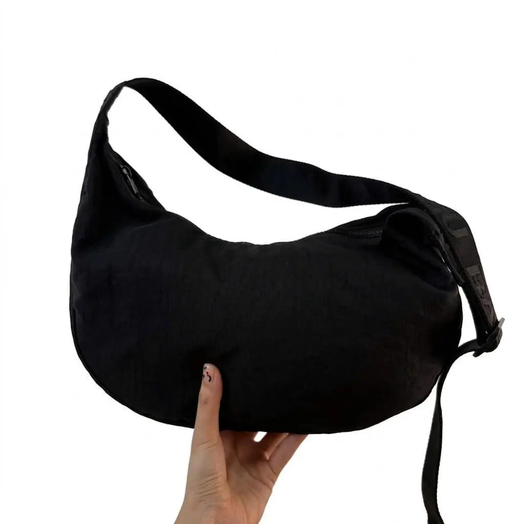 BAGGU Medium Nylon Crescent Bag - Casual & Spacious with Zippered Pockets & Adjustable Strap - 100% Recycled Nylon - Machine Washable - 13.75 x4"x8"