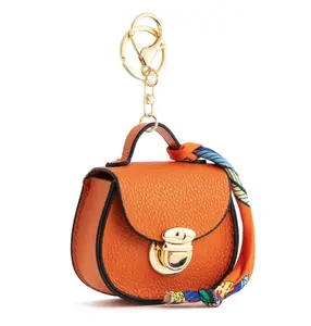 Women's Saddle-Style Mini Bag Keychain, 1PCS Waterproof PVC Pouch with Snap Closure - Multipurpose Coin, Earphone & Lipstick Holder, Cute Colorful Bag Charm for Daily Use & Gifting