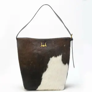 Loyal West Clara Large Bucket Bag - Cowhide Pattern with Gold Embellishment