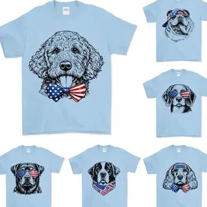 Puppy Love Dog T- Shirt showcasing 50 dog breeds in 4th of July Graphic, Light Blue, Cute Puppy Independence Day Shirt for Dog Lovers, printed on a cozy Gildan unisex T Shirt for pet lovers
