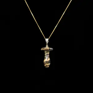 An Egyptian Glass Ear Plug Pendant Necklace, New Kingdom, Amarna Period, ca. 1550 - 1295 BCE