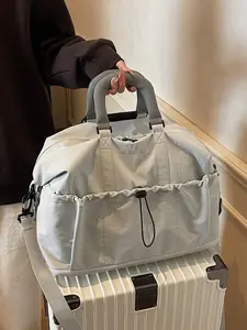 Relaxed Style Simple Casual Fashion Handbag, Featuring an External Pocket and Drawstring Design, Retro Elegant Large Capacity Crossbody Bag, Compatible with Luggage Handles, Ideal for Short Trips, Gym, and Commuting