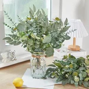 70-piece artificial eucalyptus stem and leaf greenery set, consisting of 4 types of silver-dollar eucalyptus leaves. It is an accessory for floral arrangement and home decoration, suitable for DIY bouquets and home decor.