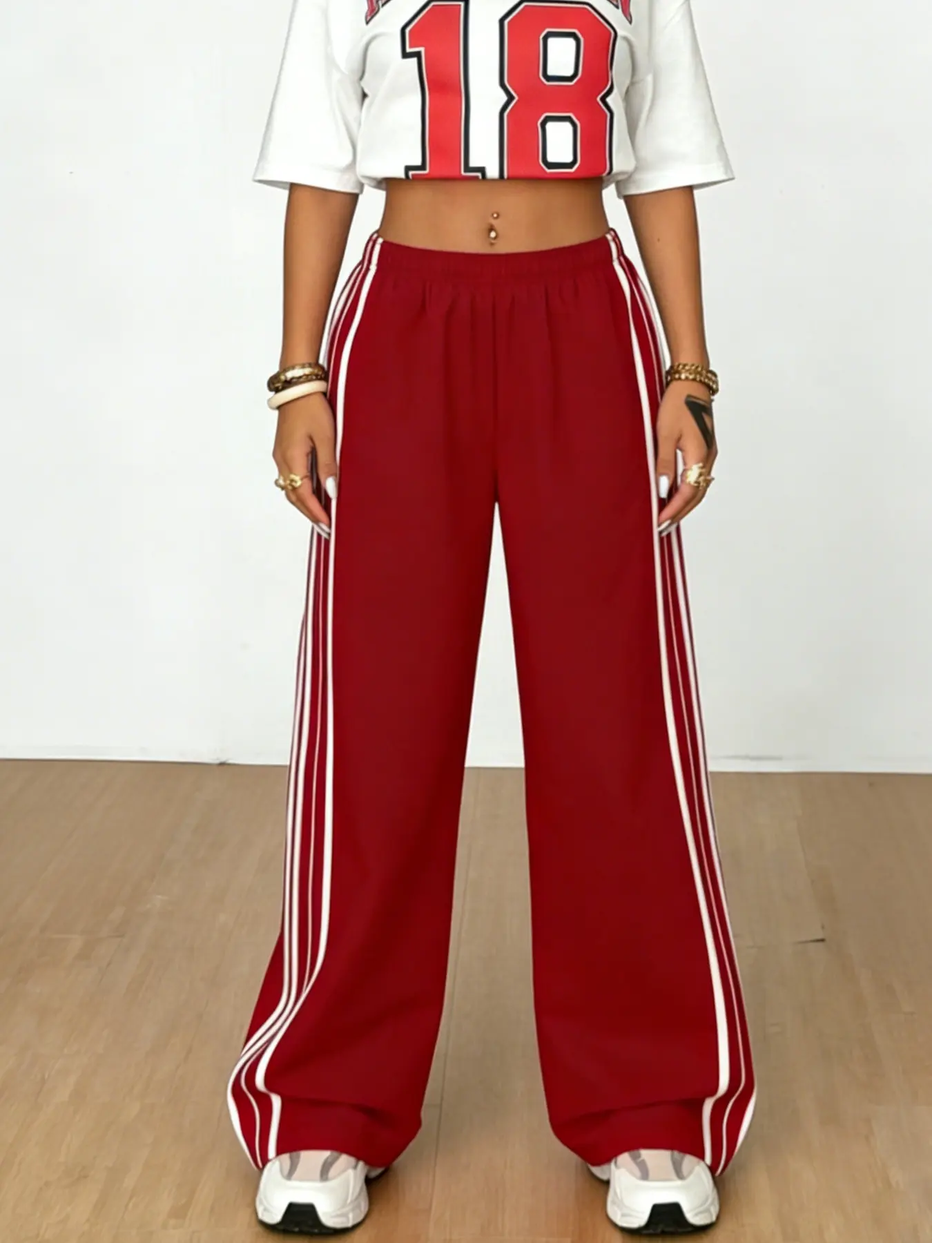 A women's casual and fashionable red side striped wide leg sports pants, casual sporty trousers, athleisure pants, high waist hanging casual straight leg floor pants, suitable for all seasons, suitable for home, indoor, and outdoor wear