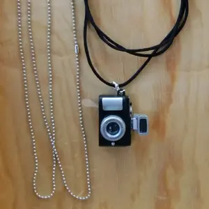Camera Necklace with cord and chain.  Actually flashes and makes shutter sound. ASMR Extra long chain and adjustable cord.