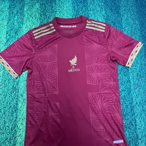 Mexico Jersey - Mexico De Oro Soccer Shirt in Maroon with Gold Accents and Logo Design
