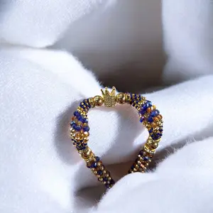 Ochosi Orisha Ilde Santo Pulvera Ochosi Guerrero Santeria Yoruba Ifa Blue Bead Bracelet with Crown Accent Cultural Significance Spiritual Connection 8 Inches