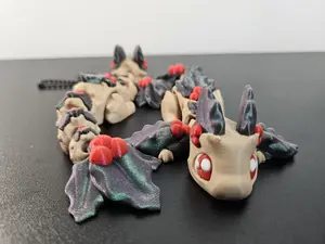 Holly the Holiday Dragon 3D Printed Articulated Fidget Toy & Keychain Ornament with Festive Red Accents and Detailed Design 6 Inches Long 3 Inches Wide