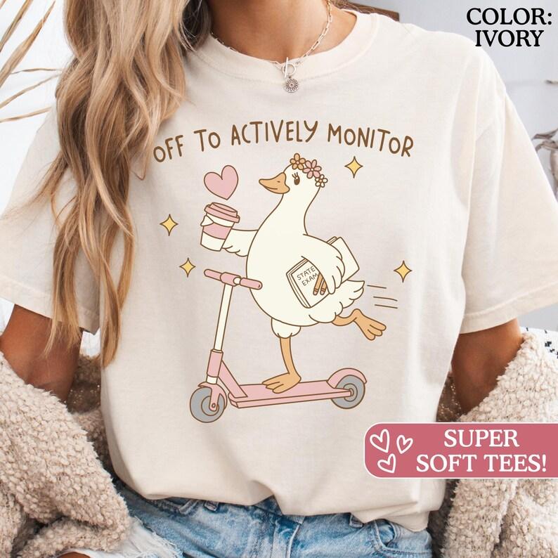 Comfort Colors State Testing Day Teacher Crew Shirt with Scooter Goose, Off To Actively Monitor Goose Teacher Shirt, Funny Teacher Shirt, Back To School Teacher Graphic TShirt
