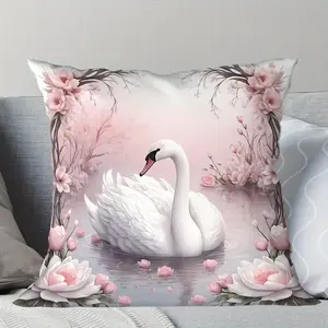 A square pillow with a printed pattern of a white swan swimming in a pond surrounded by pink flowers, made of plush material, a multi-purpose decorative throw pillow suitable for use on occasions such as Christmas, St. Patrick's Day, Valentine's Day