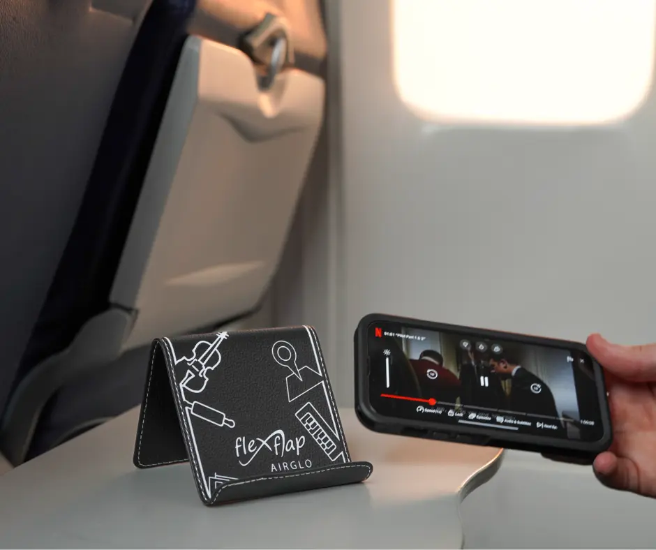 Flex Flap: The Ultimate Portable Phone and Tablet Holder Designed by a Flight Attendant. Flexible, Foldable, and Durable for Easy Travel. Perfect for Airplanes, the Office, and Anywhere You Need Hands-Free Convenience!