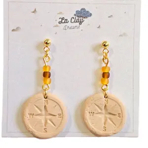La Clay Dreams Handmade Polymerclay Earrings with Compass circular Design Beige Color Dangles from Golden Plated Ball Bead