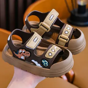 Children's sandals with cute cartoon dinosaur patterns for boys and girls, infants and young children, sandals with cool slippers, beach shoes for wearing outside, toe caps, sandals, anti kick, anti-collision, waterproof, 2026 new model