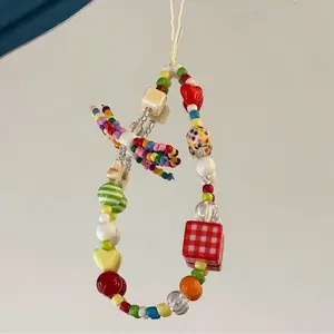 Original homemade mobile phone chain ins dopamine color bow mobile phone case lanyard handmade DIY beaded camera chain mobile phone anti-lost rope earphone cover bag pendant girl